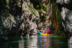 Kayaking through Rio Novella Canyon